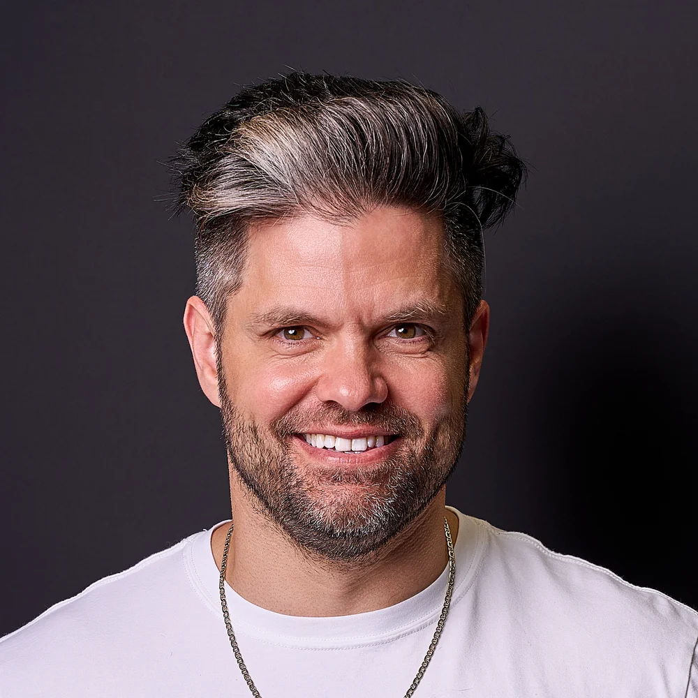 Press headshot of Joshua Albanese, founder of Spearleaf, The Reputation, and JA Headshots